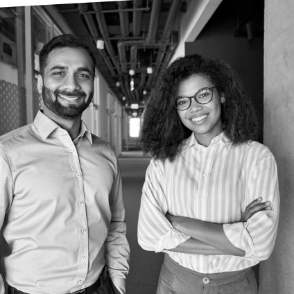 man and woman smiling at camera