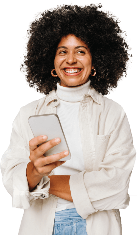 woman with big smile and a mobile phone in hand